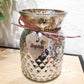 silbernes Vintage Windlicht aus Glas mit Bastschleife und Herz