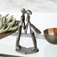 Skulptur Kuss 15cm aus Eisen brüniert