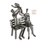 Design Skulptur "Familie auf Bank" 16cm aus Eisen brüniert
