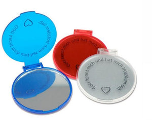 Taschenspiegel transparent rund "Gott kennt mich und hat mich trotzdem lieb"