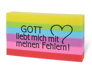 Radiergummi mit Spruch "Gott liebt mich mit meinen Fehlern" regenbogenfarben