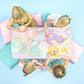 Pappteller 6 cm mit goldenem Rand, rosa